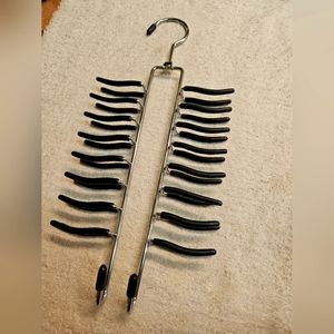 Tie or belt space saver rack. Swivel hook. Hold a bunch of items. Chains, scarfs